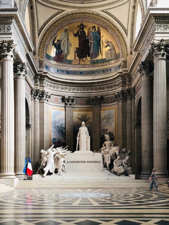 Historical artwork inside the Panthéon in Paris.