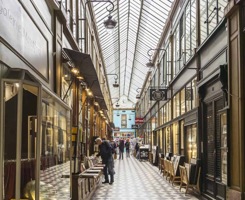 Historic and charming covered passages of Paris filled with boutique shops and cafes.