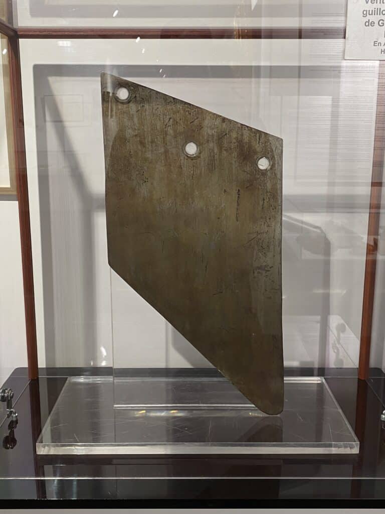 An actual guillotine blade on display at the Police Museum in Paris.