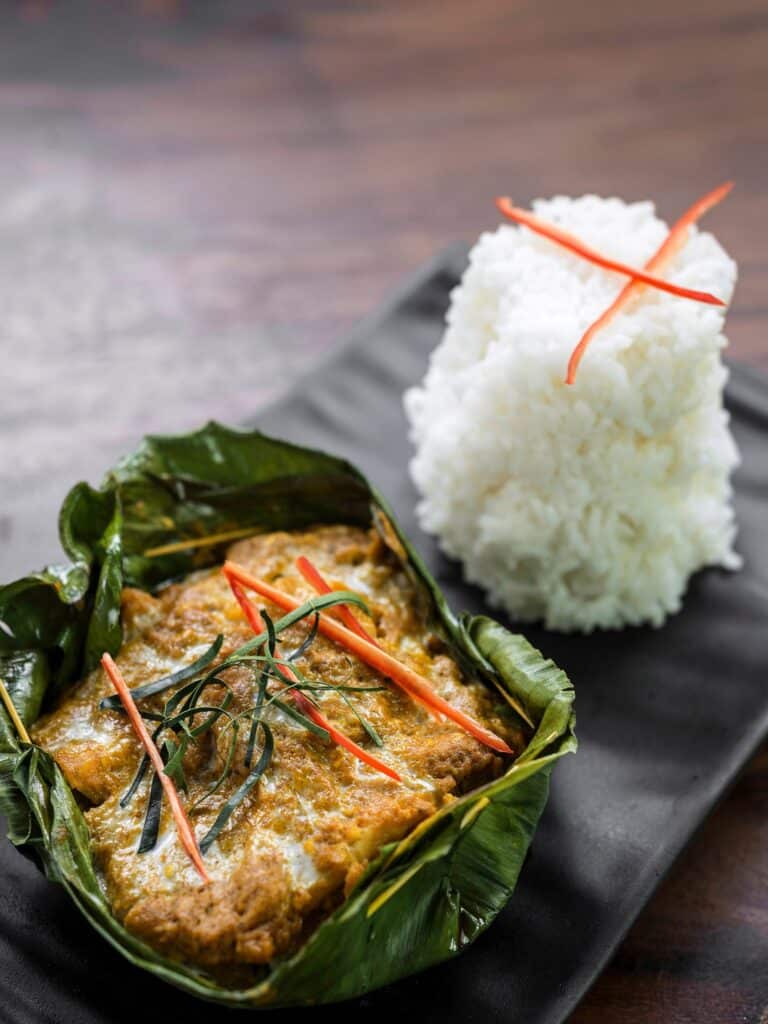 Delicious Khmer Fish Amok, a staple Cambodian New Year food, showcasing the rich flavors of Cambodia's culinary tradition for Khmer New Year 2024.