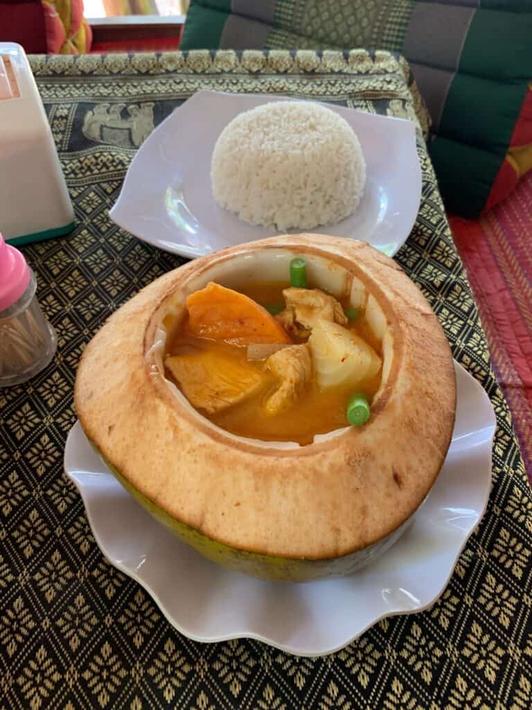 A bowl of aromatic Khmer curry, prepared for Cambodian New Year 2024, representing the blend of spices and ingredients unique to Cambodia.