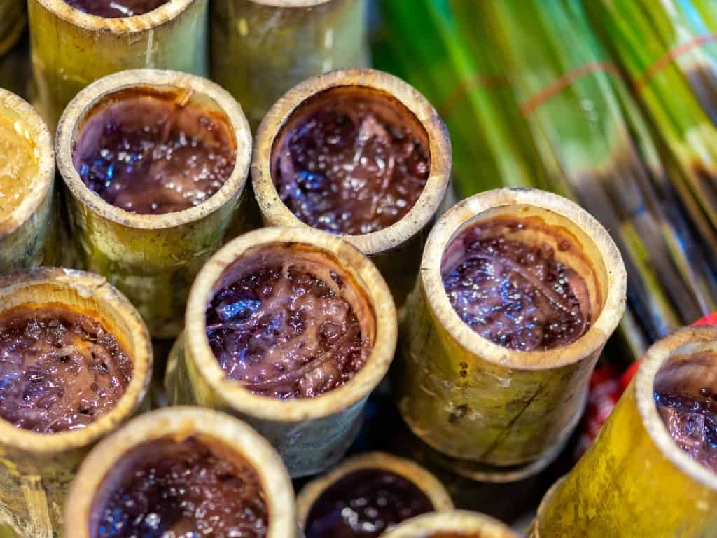 Kralan, a traditional Cambodian New Year food made from sticky rice and coconut, a culinary highlight of Khmer New Year 2024.