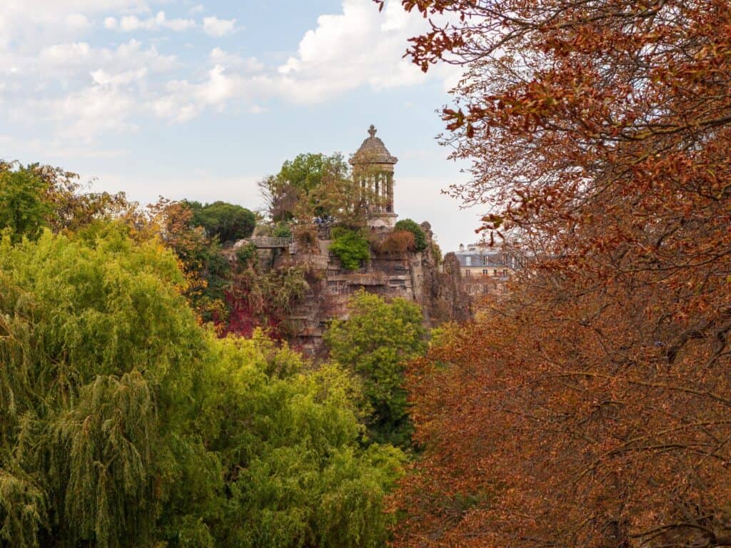 Waterfall and bridge at Parc Buttes Chaumont in Paris.