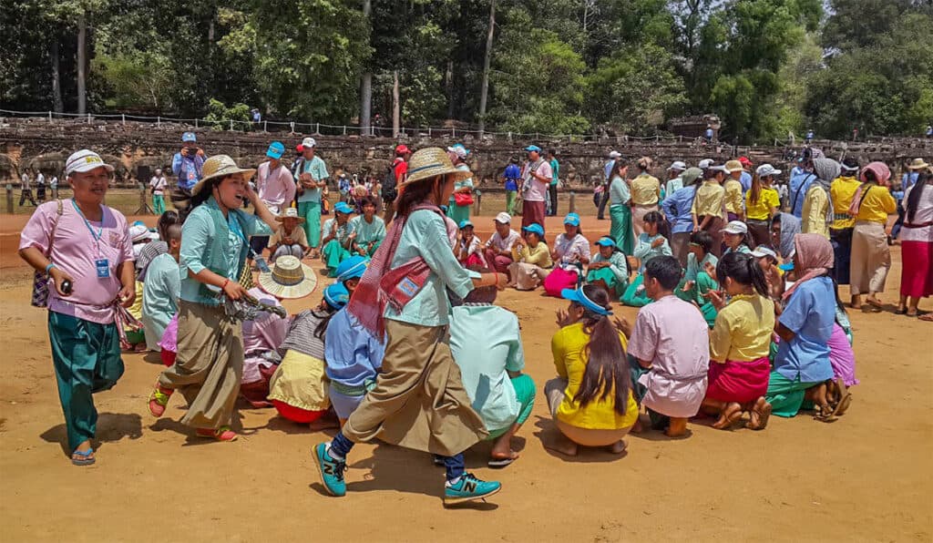 The Leak Kanseng game in action, a circle game involving a Cambodian towel, showcasing traditional fun during Khmer New Year 2024.