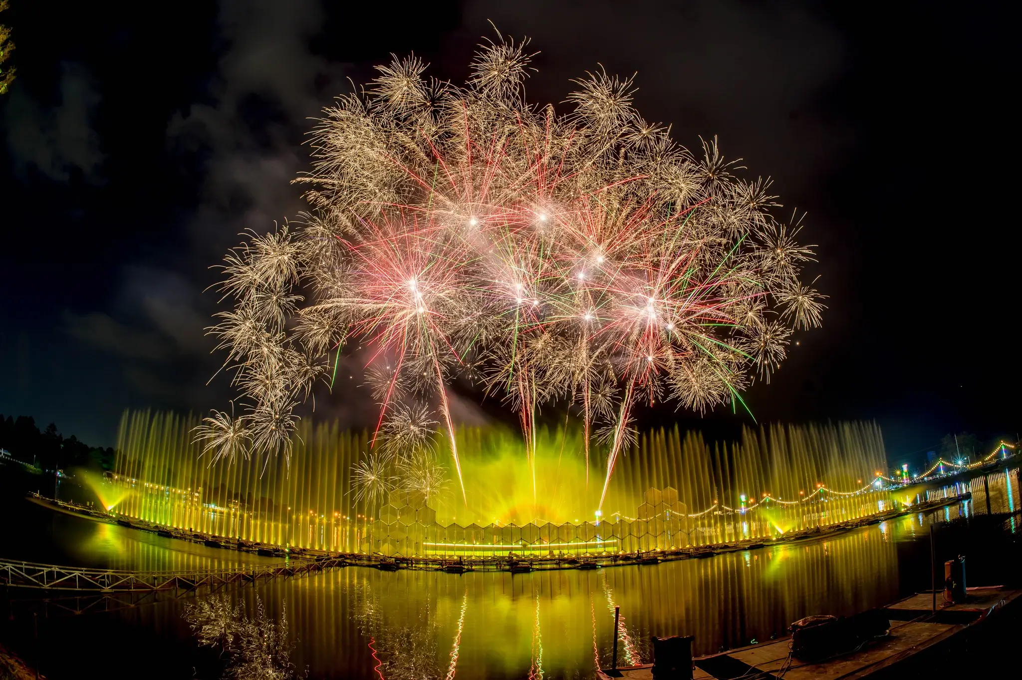 a display of fireworks and light show at the Charming Chiang Mai Flower Festival 