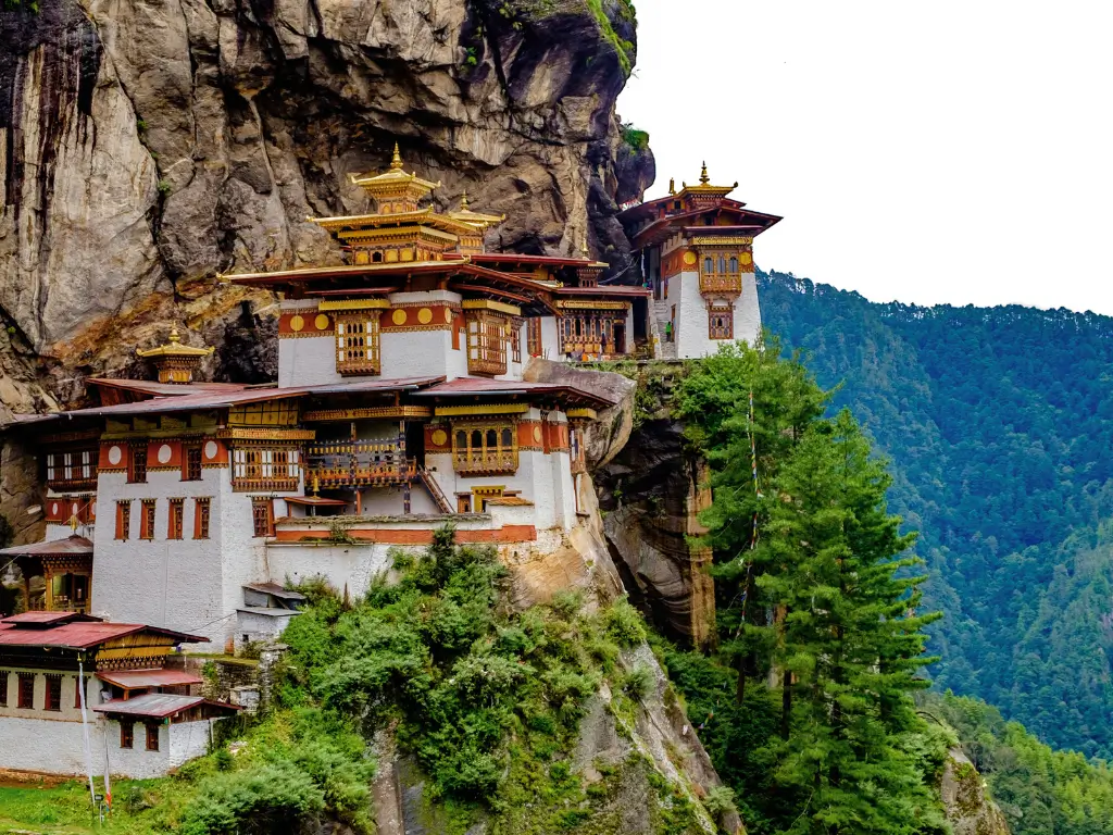 Iconic cliffside Paro Taktsang monastery, also known as Tiger's Nest, in Bhutan, a spiritual retreat and a highlight for slow travel destinations.
