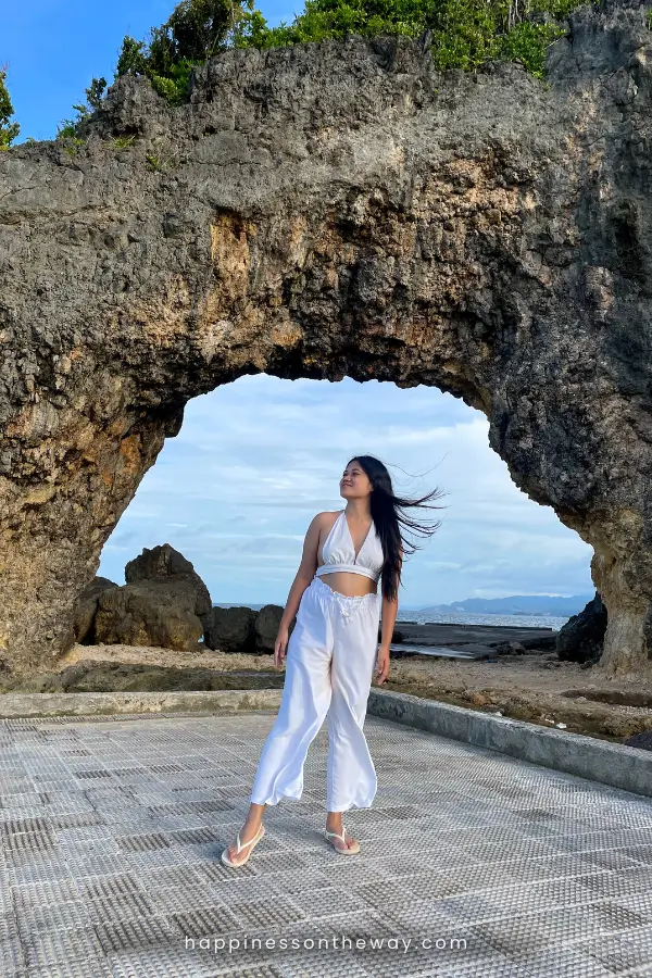 Me standing before the natural limestone arch known as Boracay Keyhole.