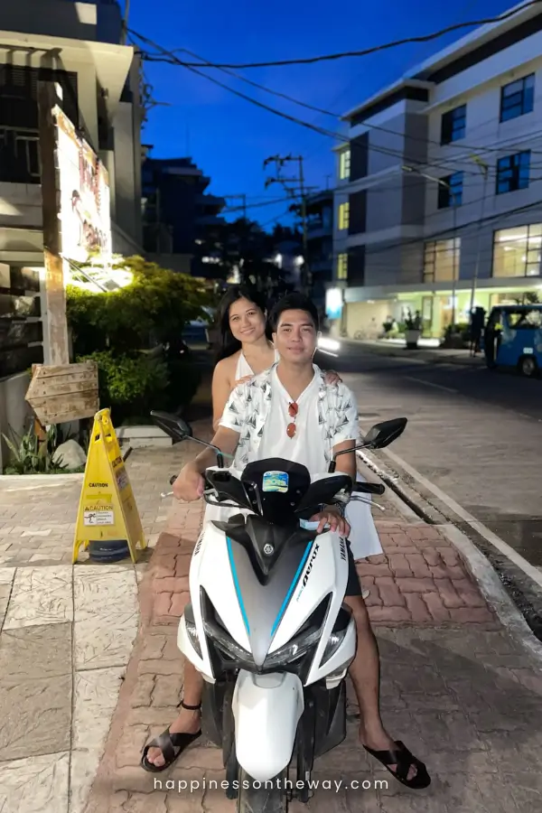 My friend, Rae and I, on scooter at night in Boracay land tour.