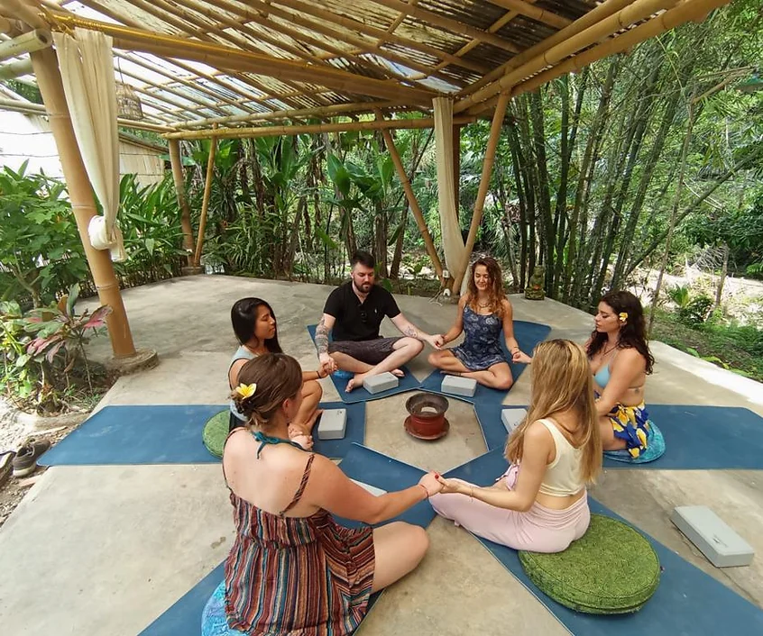 Group circle of connection during a self-love and emotional healing retreat in Bali
