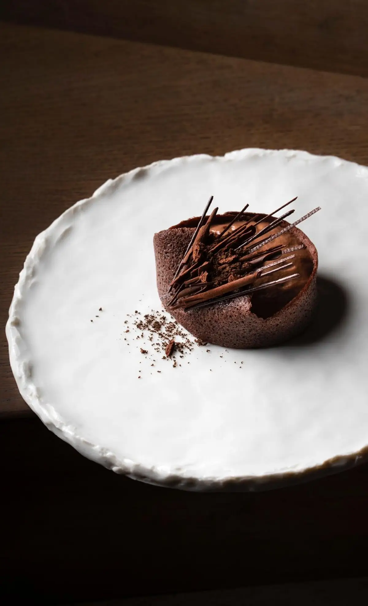 A chocolate dessert at Granite, featuring a delicate presentation on a white plate