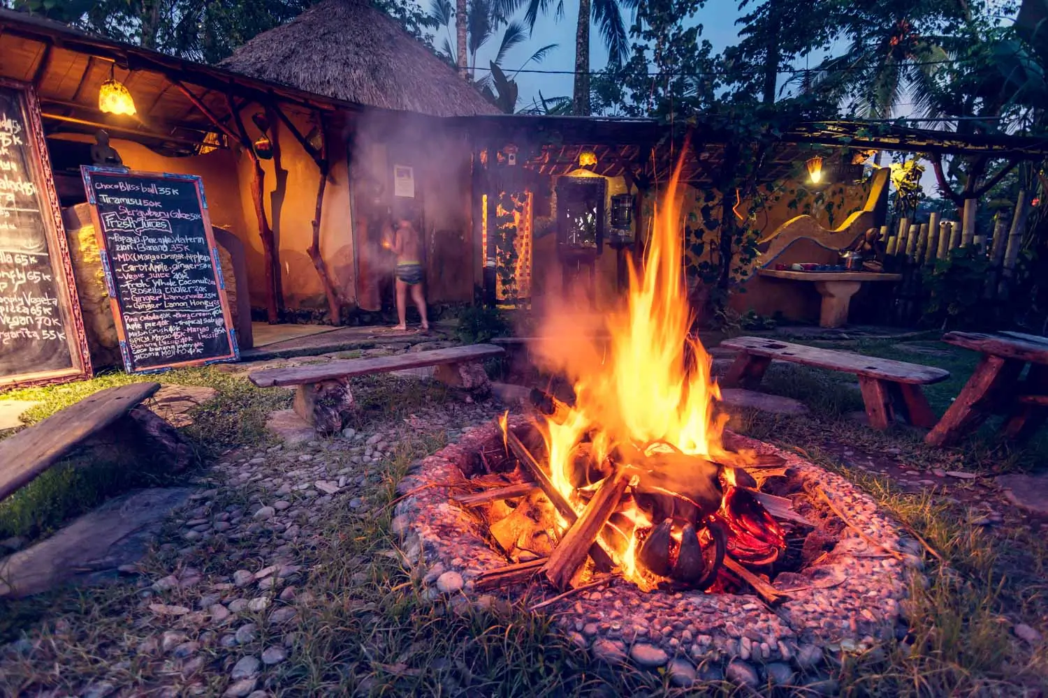 Dragonfly's Bali sauna rooms with a bonfire in the middle