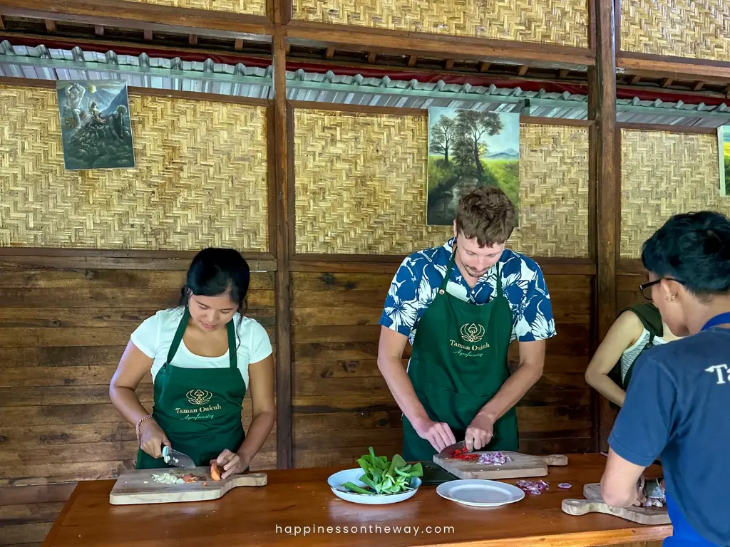 Me and mat chopping ingredients for our nightime cooking class in Ubud