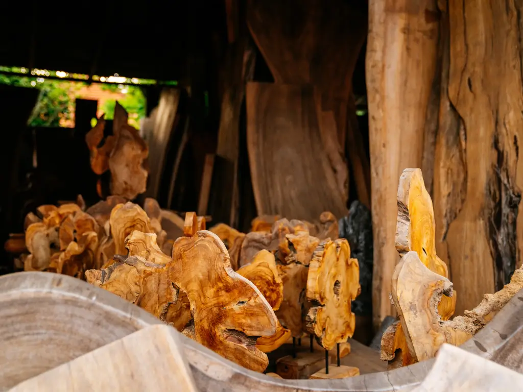 Carved woods in a wood carving workshop in Bali