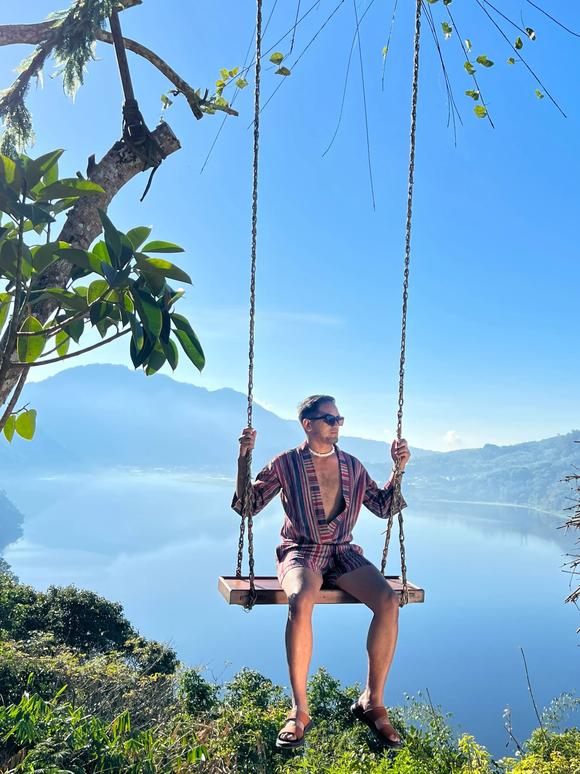 My friend Merald, sitting on wanagiri swing in munduk bali.