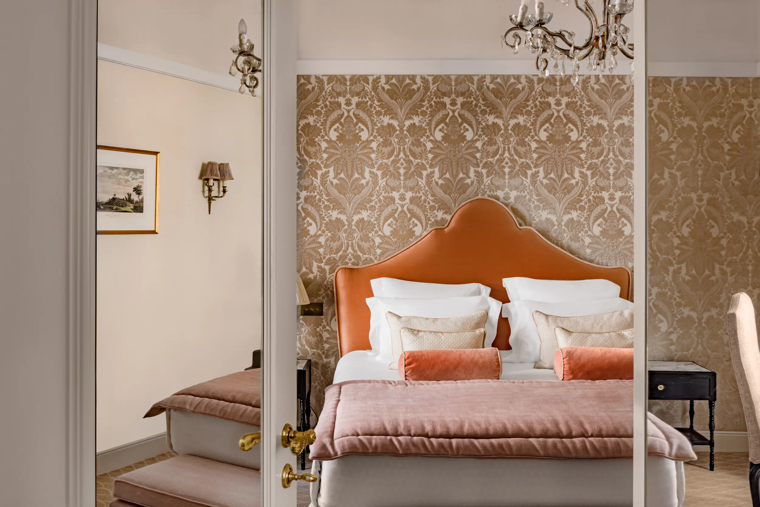 Elegant bedroom at Relais Christine, a quiet hostel in Paris with luxurious decor.