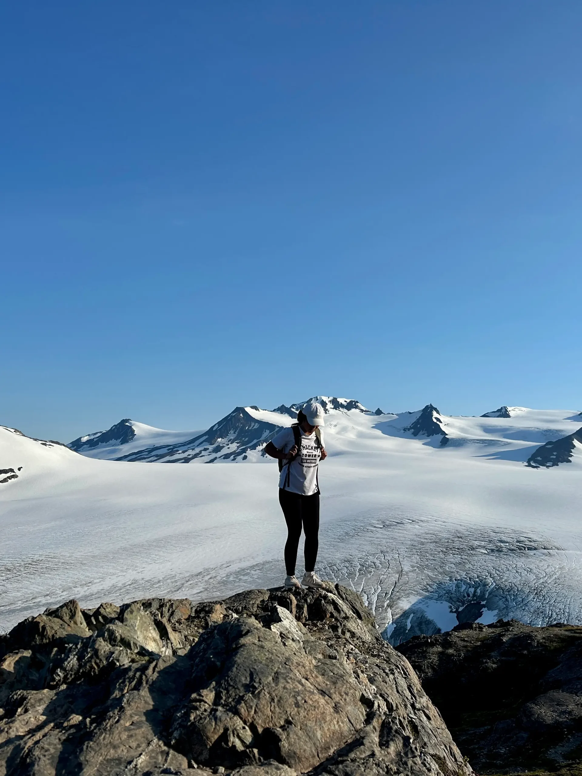 Standing above a glacier in Alaska
