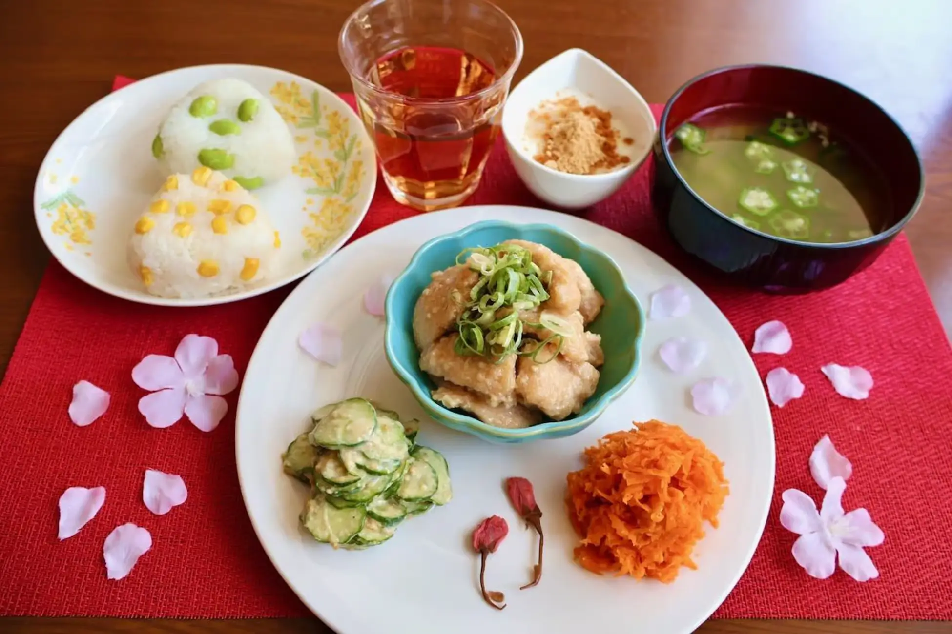 Fermented Japanese meal set with miso soup, cucumber salad, shredded carrots, and bite-sized pieces