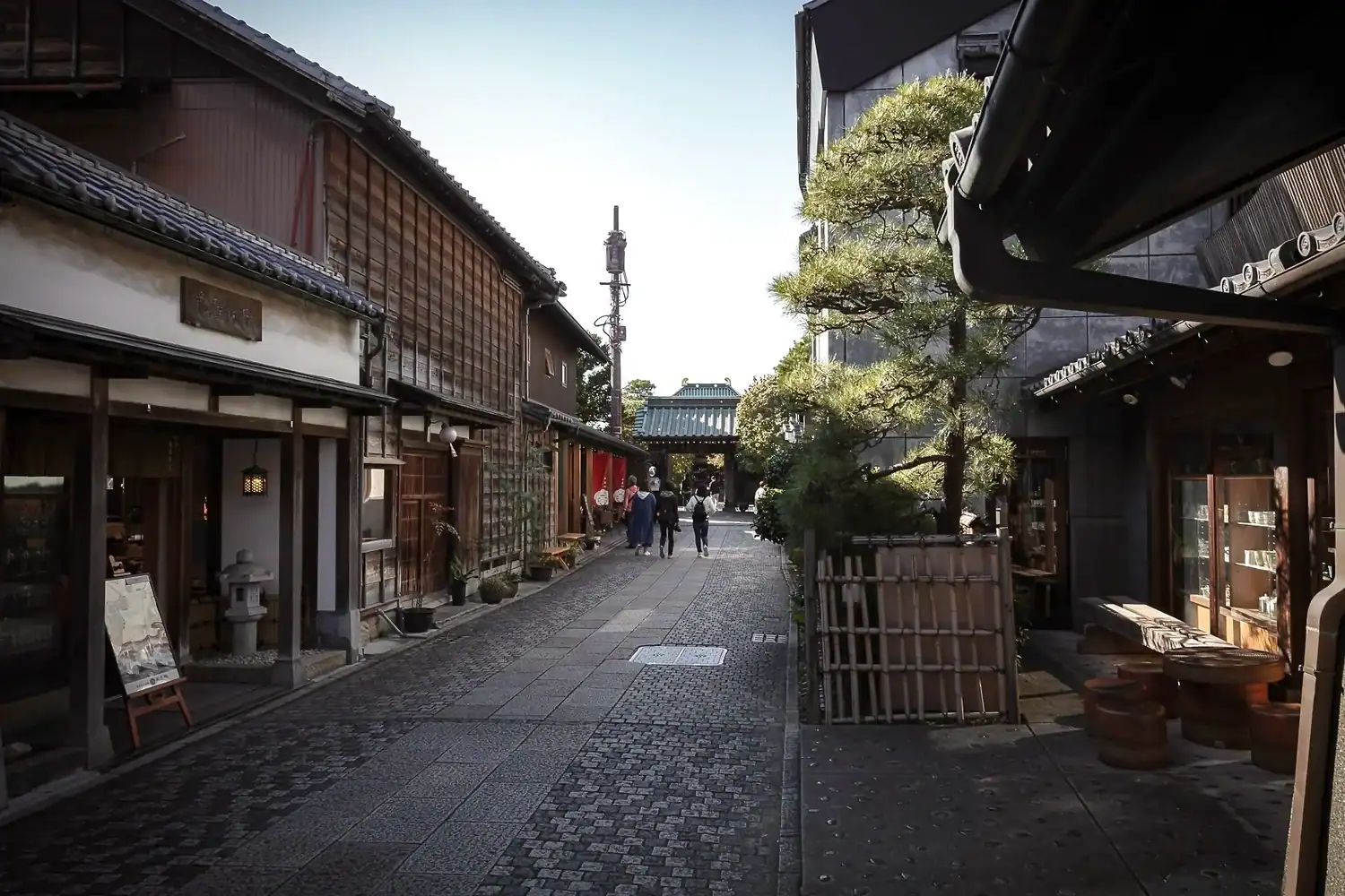Kawagoe's preserved Edo-period wooden merchant houses and clay-walled warehouses lining a quiet stone street