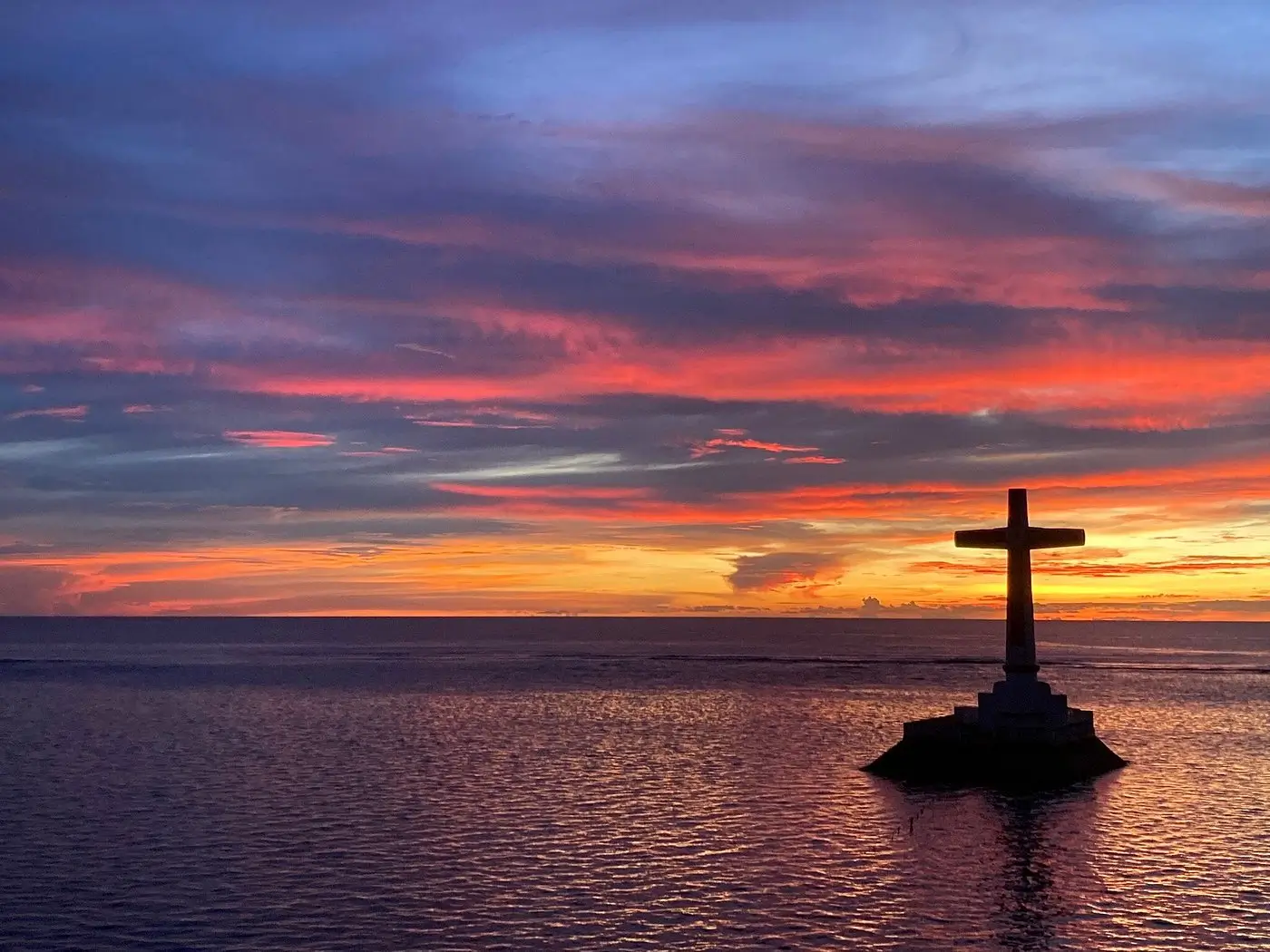 The stunning sunset from the Sunken Cemetery, one of the best places to visit in Mindanao.