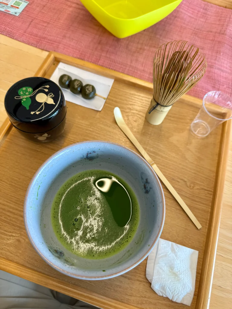 Things to Do in Uji: enjoying a bowl of freshly whisked matcha during a traditional tea ceremony