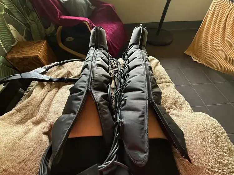 A person's legs wrapped in black compression gear of Phuket Cleanse, one of the best detox retreats in Phuket.