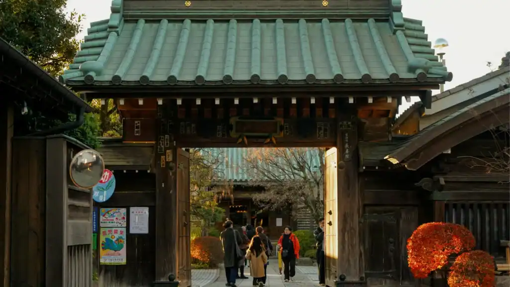 Traditional festivals in Japan experienced by locals wearing kimono and haori while walking toward a shrine.