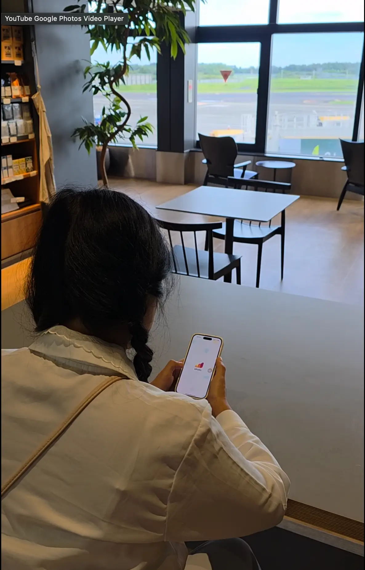 Activating an eSIM on a smartphone at the airport before departure, part of how to prepare for a trip to Japan for first-timers.