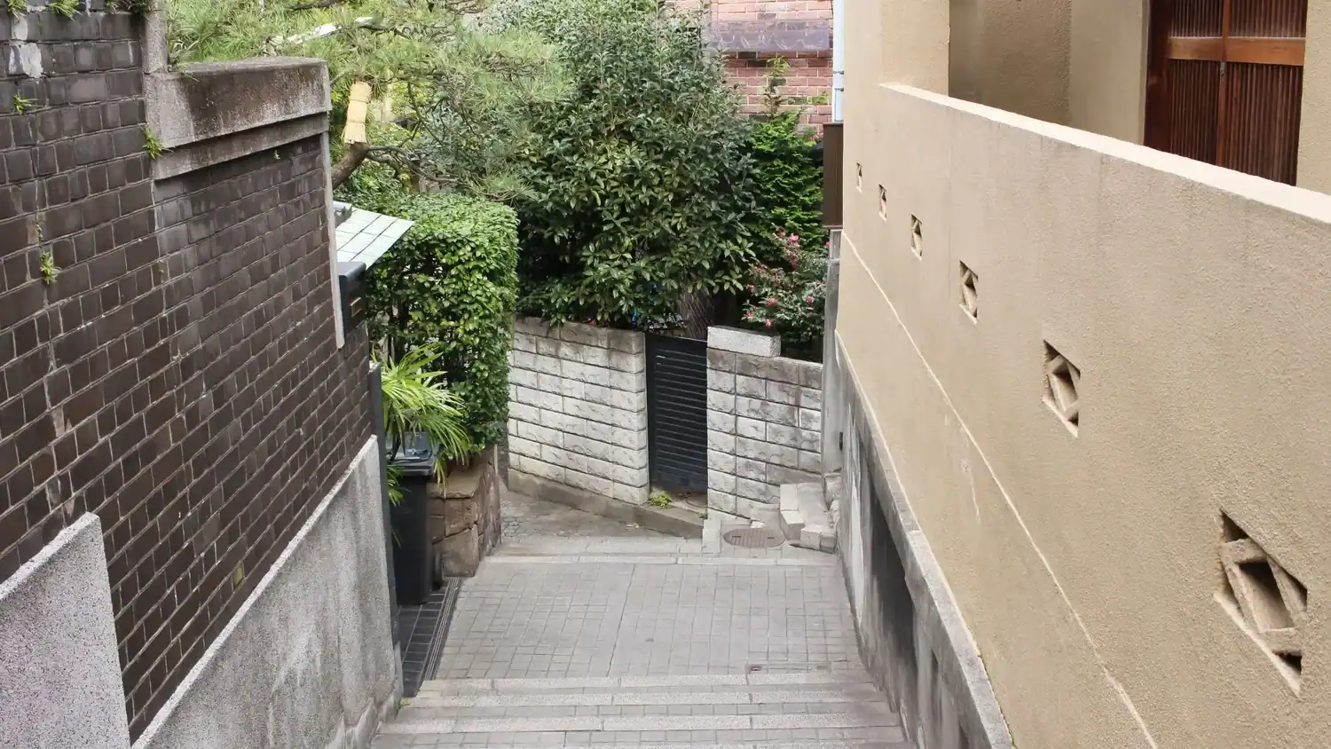 Narrow stone steps winding through Kagurazaka, one of Tokyo hidden gems away from crowds
