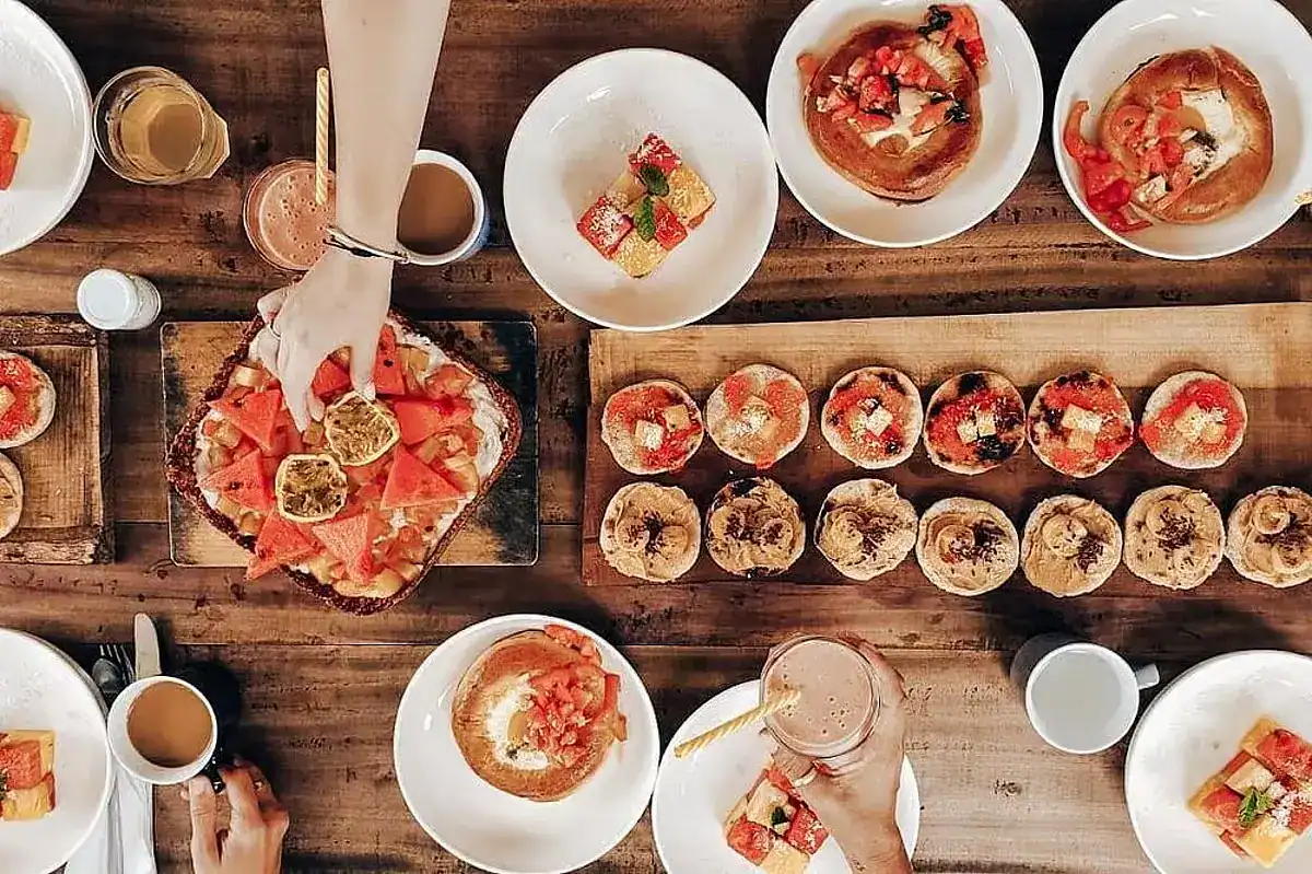 A table full of food from Basecamp Sri Lanka, one of the most affordable yoga retreats in Sri Lanka.
