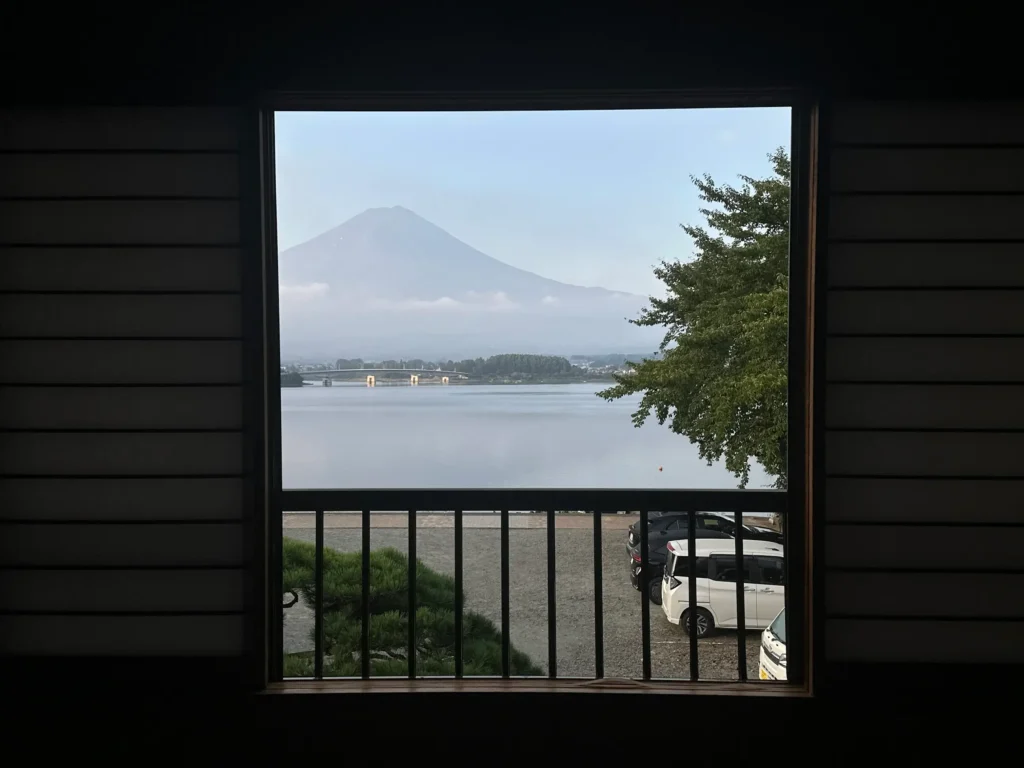 Mt. Fuji view from Komaya Ryokan room window overlooking Lake Kawaguchi in the early morning.