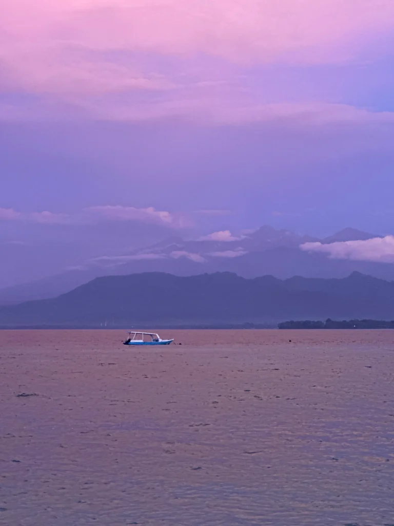 Sunset view from the west side of Gili Air with Mount Agung in the distance, a must see among things to do in Gili Air